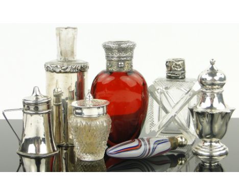 A Victorian ruby glass and silver mounted perfume bottle,
together with other perfume bottles and cruets, (7).