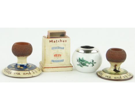 A Meissen porcelain match striker with silver mount,
2.25" across, 2 Torquayware match strikers and another, (4).