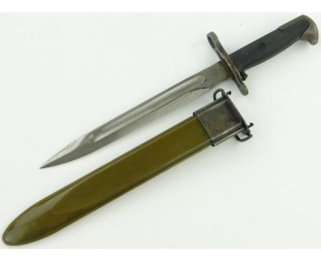 A U S Army bayonet,
1943 with original scabbard, blade length 9.5", overall length 16"