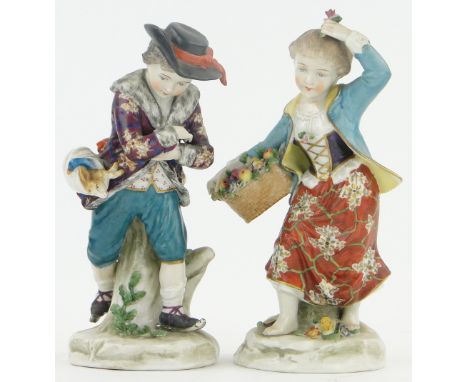Pair of continental porcelain figures of children,
both with gold anchor marks, height 6.5".