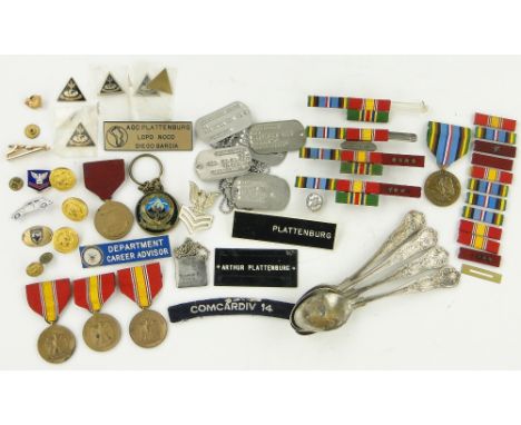 A group of military items,
including continental medals, US Navy spoons, buttons, etc.