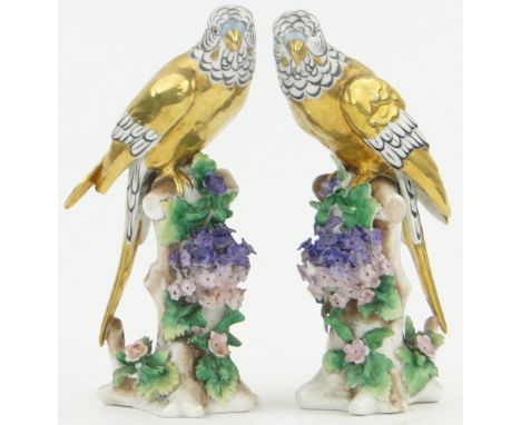 Pair of continental gilded porcelain parrots,
gold anchor marks, height 6.5".