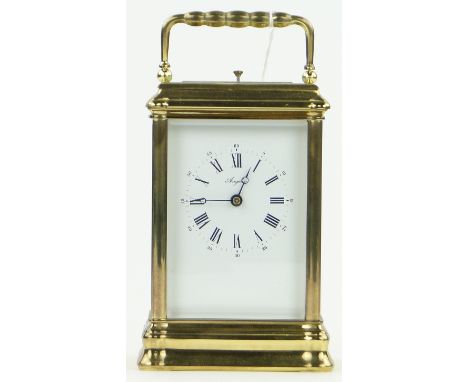 A brass cased repeating carriage clock,
height 5.75".