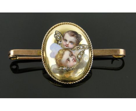 A 9ct gold diamond and enamel cherub design brooch,
hallmarks Chester 1913, setting height 28mm.