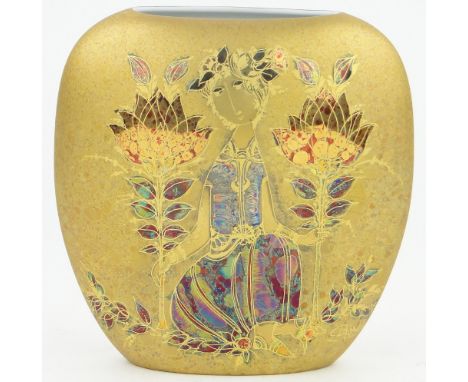 A Rosenthal gilded porcelain vase,
decorated with a stylised figure and flowers, signed Bjorn Winblad, height 8.5".