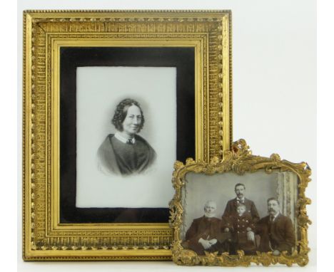 A 19th century Irish studio portrait by Thomas H Relly of Dublin,
gilt framed, height 12"  overall, and a family photograph i
