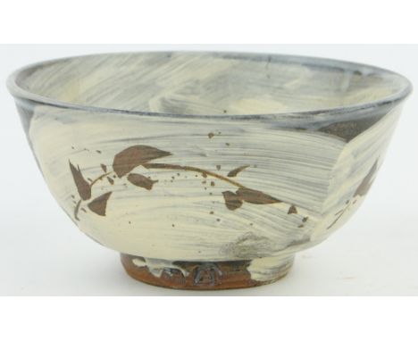A Jim Malone Studio Stoneware pottery bowl,
7.25" across with Hakame glaze and Aynesly seal.