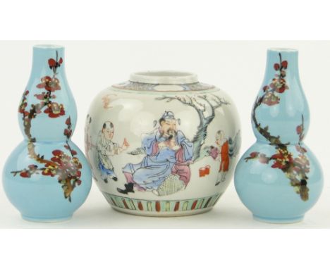 A Chinese porcelain ginger jar,
with painted figures and pair of blue ground Oriental vases, height 5.25", (3).