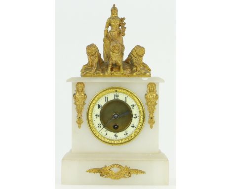 A white alabaster mantel clock,
single train movement, surmounted by a spelter figure and lions, height 1'2".