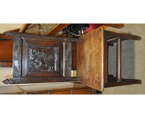 An Antique carved oak side chair,
the panel depicting Christ at the well.