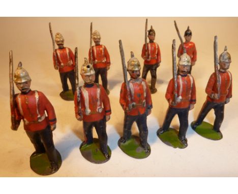 Britains from set 36, Royal Sussex Regiment Germanic FIRST VERSION (F, two helmet spikes missing) with a West Surrey and a se