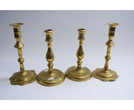 Two pairs of brass candlestick