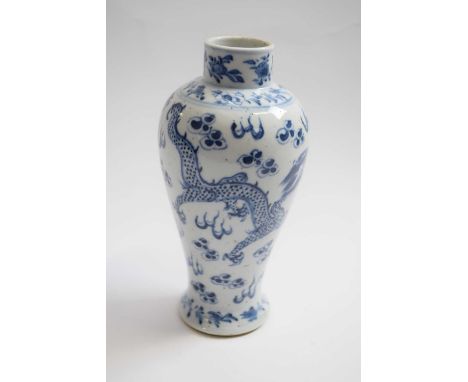 19th Century Chinese porcelain vase decorated in blue and white with a dragon chasing the flaming pearl, 18cm high (repair to