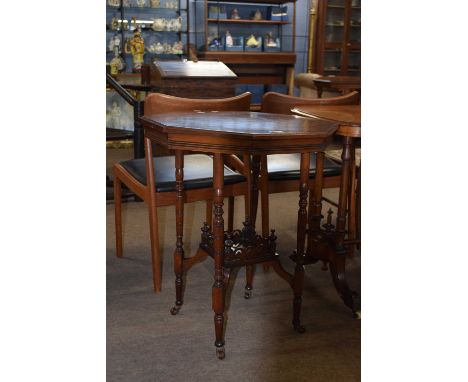 Late 19th Century mahogany octagonal centre table raised on turned legs with base shelf and casters, 60cm wide