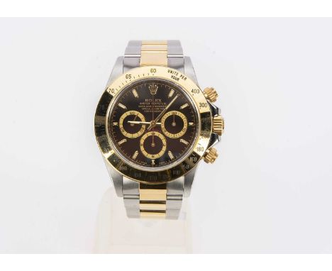 A 1990s Rolex Oyster Perpetual Daytona stainless steel and 18ct gold wristwatch, 40mm, ref. 16523, black dial with three subs