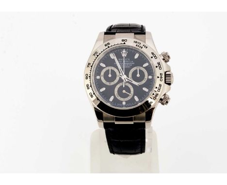 A 2000s Rolex Oyster Perpetual Daytona 18ct gold cased wristwatch full set, 40mm, ref. 116519, black dial with baton markers 
