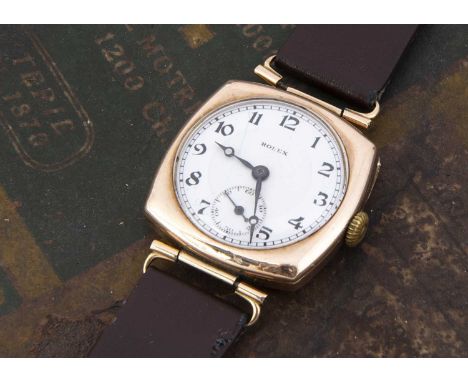 A 1920s Rolex 9ct gold cased manual wind wristwatch, 29mm case ref. 897, white enamel dial with Arabic numerals and subsiduar