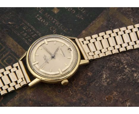 A late 1950s Longines Conquest Automatic 18ct gold cased gentleman's wristwatch, 34.8mm case, gilt dial with batons, with dat