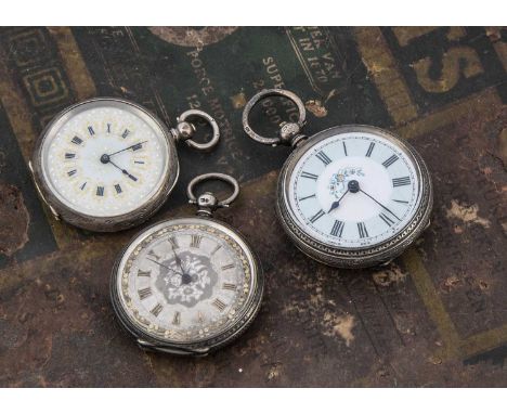 Three Victorian and later silver open faced ladies pocket watches, the largest 42mm with light blue enamen and flowers to dia