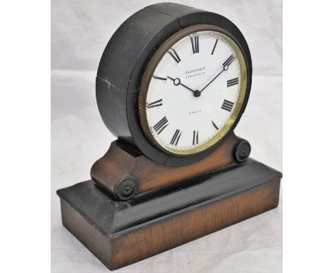 A Victorian walnut and ebonised cased mantle clock, the circular enamelled dial with Roman numerals inscribed "Calderwood Pim