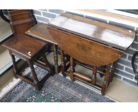 An oak oval gate-leg drop-leaf tea table in the early 18th Century manner of small proportions together with two joined oak s