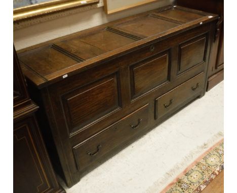 A 18th Century mule chest, the panel top above three panel front above two drawers raised on style supports  CONDITION REPORT