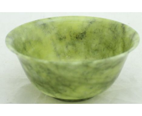 A Chinese jade bowl of flared form, in box