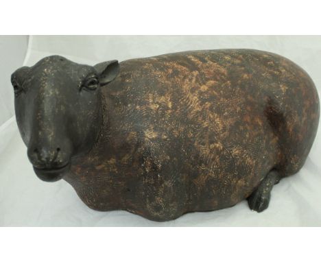 A large glazed pottery figure of a recumbent sheep, an embossed leather covered cylindrical stick stand, adjustable hat rack 