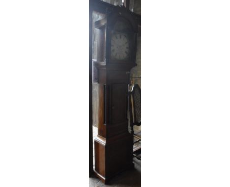 A mahogany longcase clock with column decorated body to plinth base, the painted dial inscribed "Jno Crockett Pontypridd"