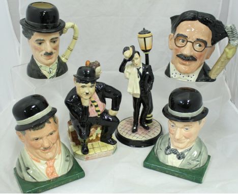 A collection of five Royal Doulton "Celebrity Collection" character jugs including Louis Armstrong, Groucho Marx, Mae West, J