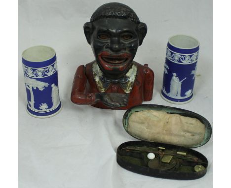 A cased set of 19th Century guinea scales, a Blackamoore painted cast iron money bank and a pair of Wedgwood cylindrical Jasp