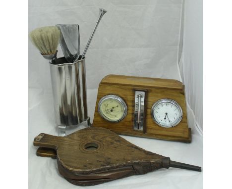 A mid 20th Century walnut cased weather gauge, a small aneroid barometer, fireside companion set, pair of bellows, student ty