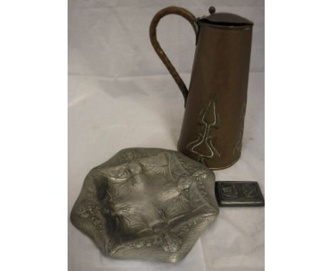 An American Art Nouveau pewter plate with embossed decoration of women in robes, bears medallion verso inscribed "Plate guara