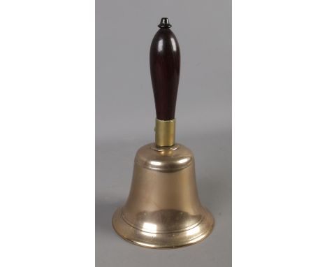 A vintage brass school bell.  