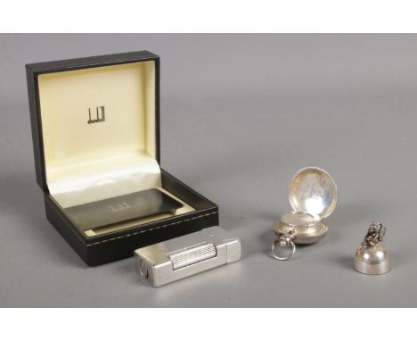 A silver plated Dunhill lighter in box, together with a silver sovereign holder and tooth fairy tooth cover lid. Silver sover