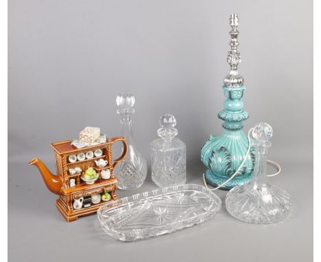 A Portmerion Novelty teapot along with collection of cut glassware and blue glazed pottery lamp.  Blue lamp scratch to top of