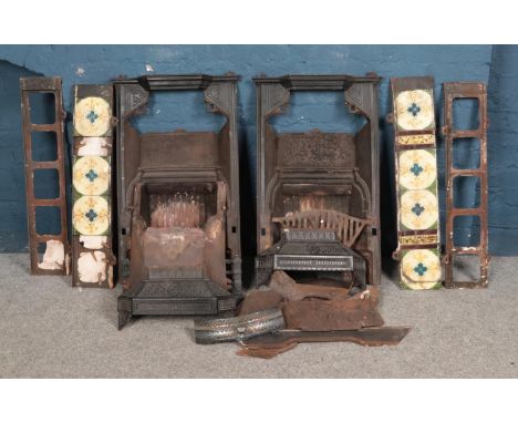 Two cast iron fireplaces, together with fireplace tile surrounds (some missing) and fire grates etc. Dimensions of fireplaces