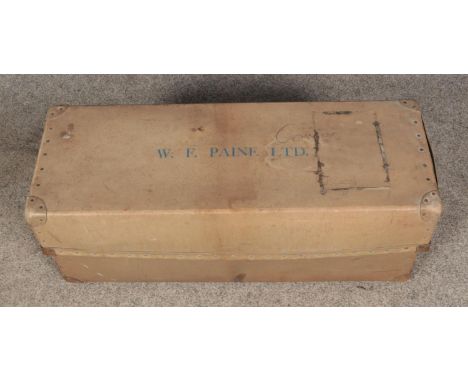 A vulcanised fibre trunk bearing W.F Paine Ltd. to top.  