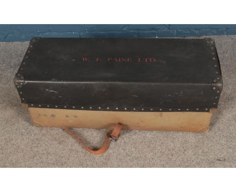 A vulcanised fibre trunk bearing W.F Paine Ltd. to top.  
