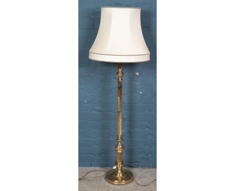 A gilt metal standard lamp.  