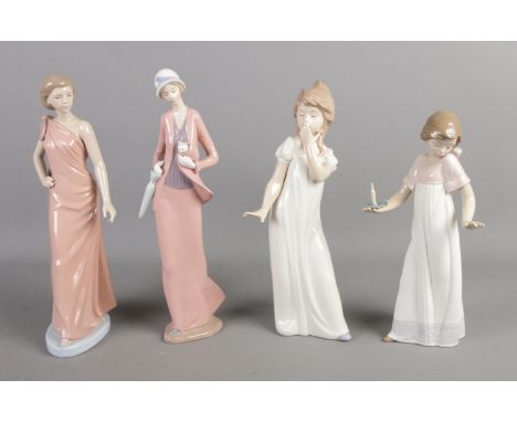 Four NAO by Lladro ceramic figures, to include girl with candle and woman with parasol and cat.  Small nibble to woman with p