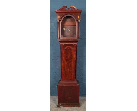 A Georgian mahogany longcase clock case, featuring double swan neck pediment and diamond marquetry banding to the top of the 