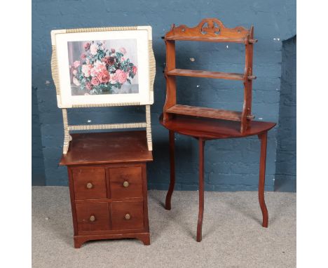A quantity of assorted furniture to include fire screen, chest of drawers, display rack, etc.  