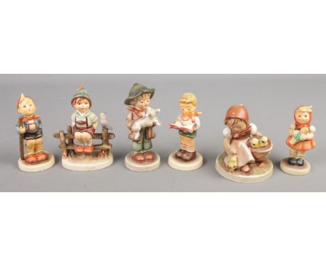 Six Goebel figures. Includes 'Little Hiker', 'Honor Student', etc.  