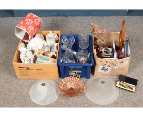 Three boxes of miscellaneous. Includes glass light shades, wooden sculptures, ceramics, decanters etc.  