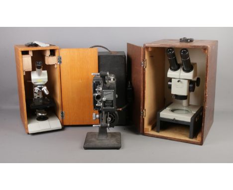 Two boxed microscopes, together with a boxed Kodascope 8 projector. Microscopes M6C-9 and Griffin Carton.  