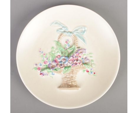 A Newport Pottery Clarice Cliff cabinet plate. Decorated with a hand painted bouquet of flowers.  