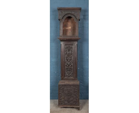 A Nineteenth Century carved oak gothic longcase clock case, for restoration. 209cm tall.  No glass, front left left foot is m