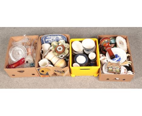 Four boxes of miscellaneous ceramics and glassware to include tea service, salt lamp, art glass, etc.  