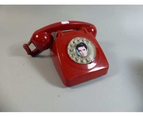 A Vintage Red Bakelite Telephone 